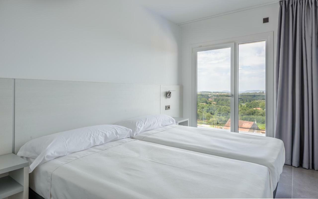 Apartamentos Onzamar Sanxenxo Esterno foto