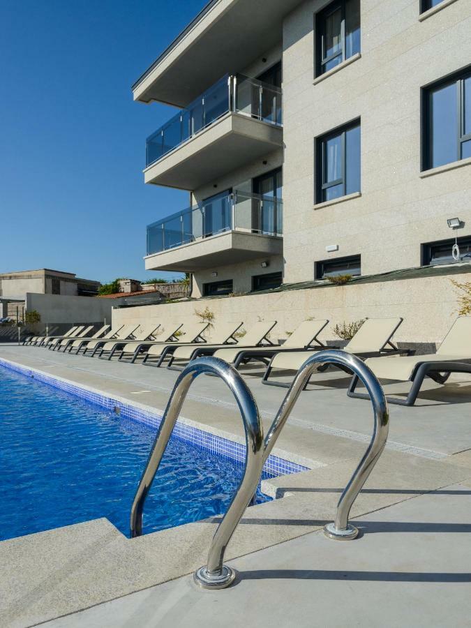 Apartamentos Onzamar Sanxenxo Esterno foto
